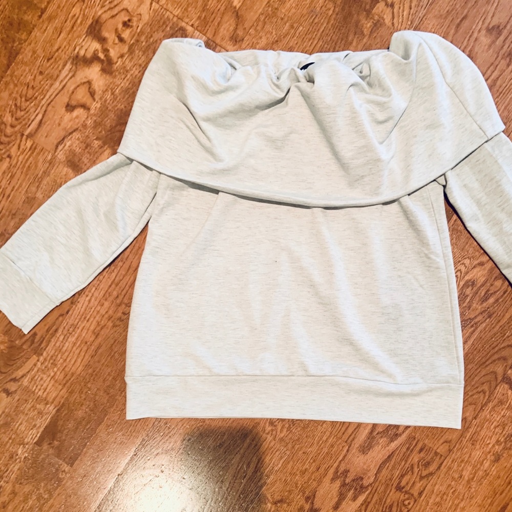 Long sleeve top baby blue color with boat neckline